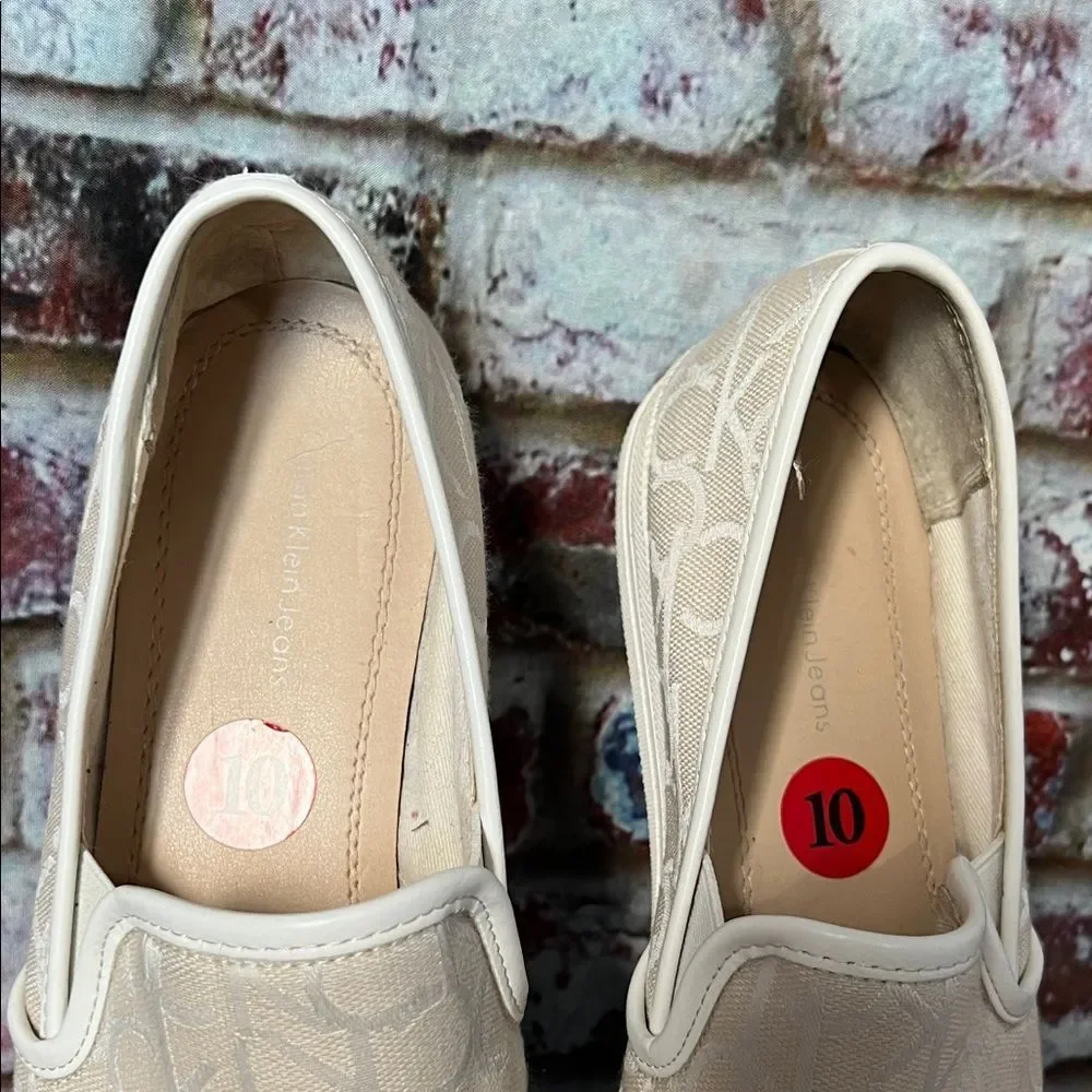 * Calvin Klein Cream Slip-On Sneakers